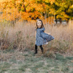Dance Classes in Toronto - Little girl twirling in a dress in high park Toronto