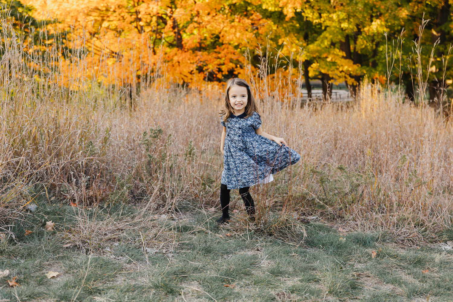 Dance Classes in Toronto - Little girl twirling in a dress in high park Toronto