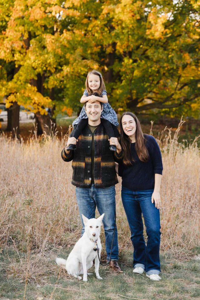 Family enjoying High Park in the fall.