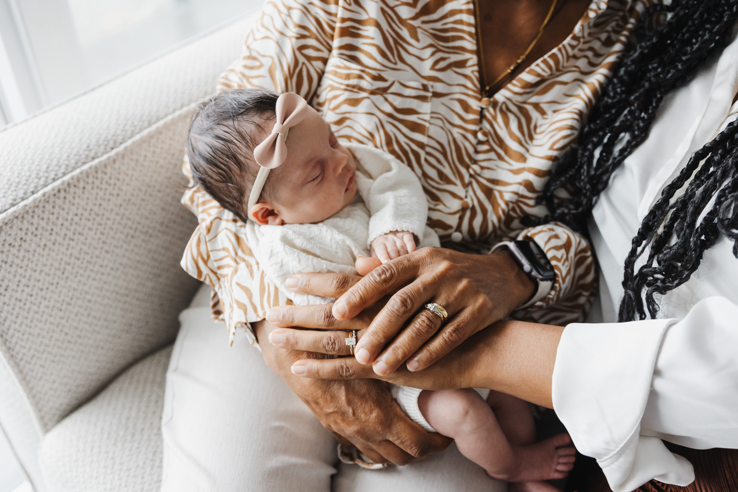 3 generations of hands captured during newborn photography session 