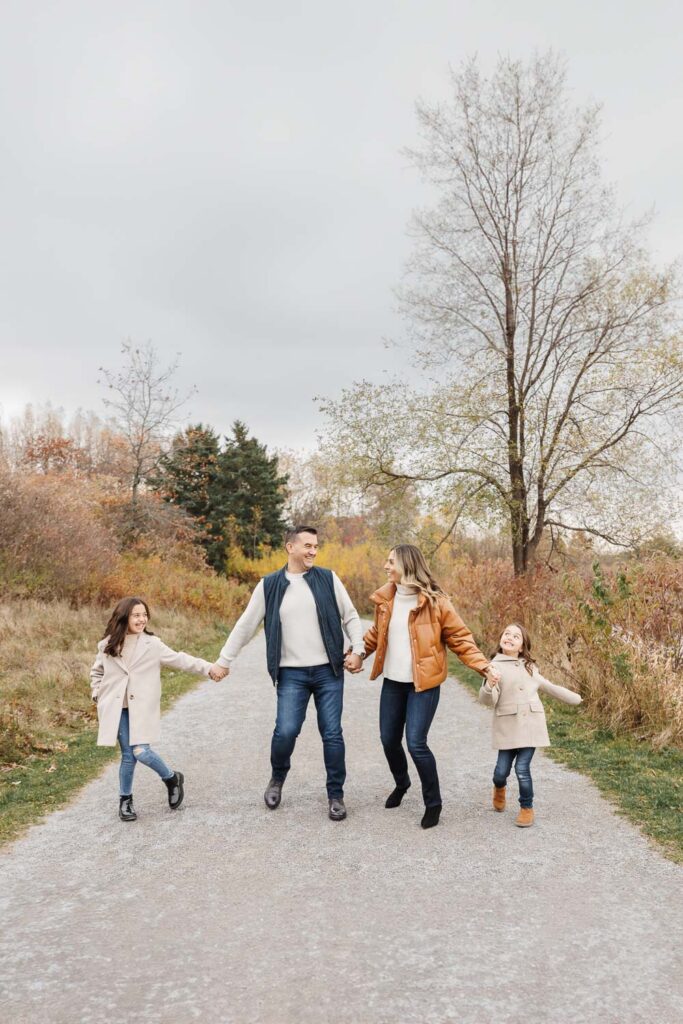 fun family moment in Samuel Smith Park Etobicoke during family photos